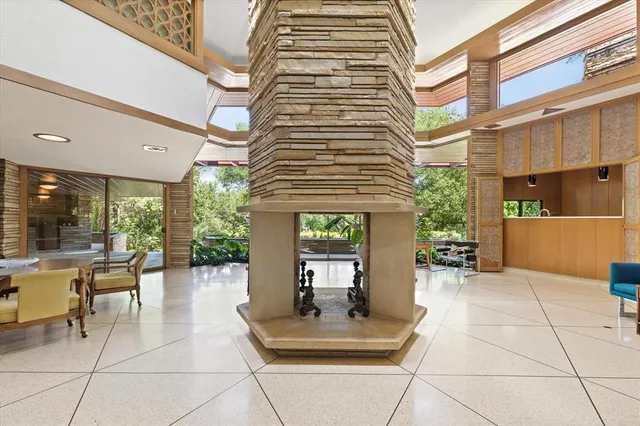 a view of a building with outdoor seating