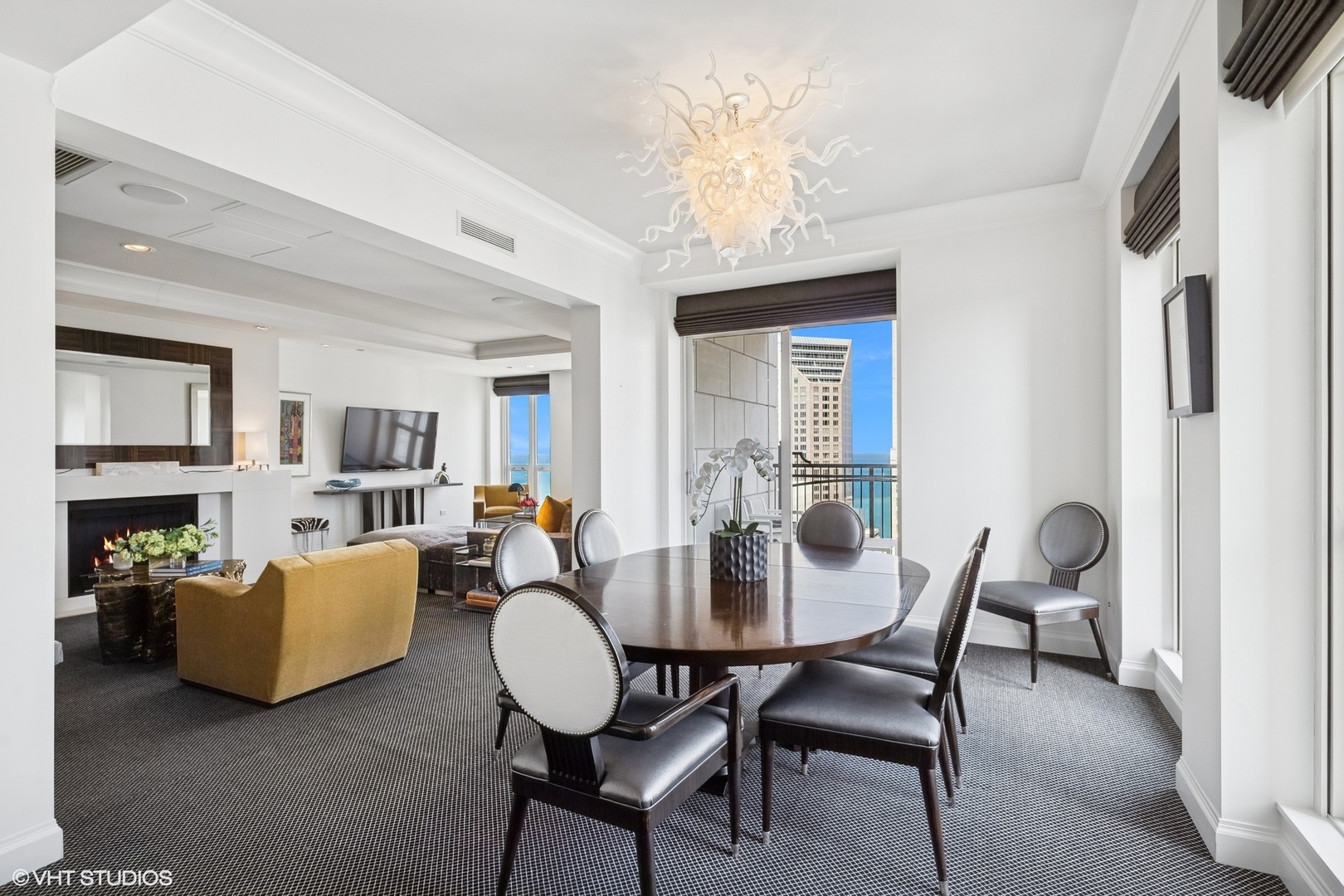 11 East Walton Street, Unit 4101 Chicago, IL 60611 - Photo 11 of 45 a view of a dining room with furniture