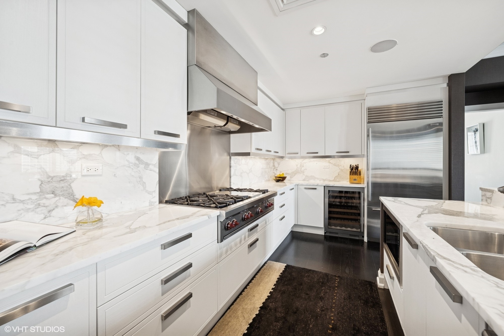 11 East Walton Street, Unit 4101 Chicago, IL 60611 - Photo 18 of 45 a kitchen with a sink a stove and refrigerator