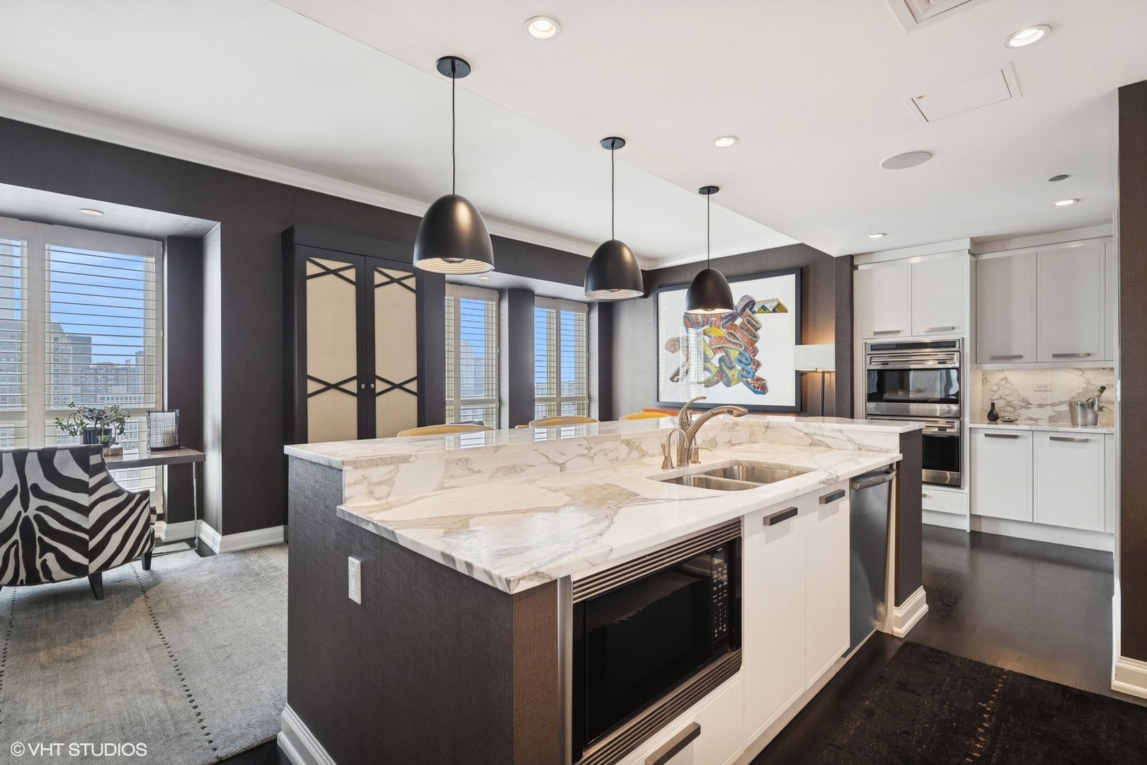 11 East Walton Street, Unit 4101 Chicago, IL 60611 - Photo 19 of 45 a kitchen with stainless steel appliances granite countertop a sink a stove and a refrigerator