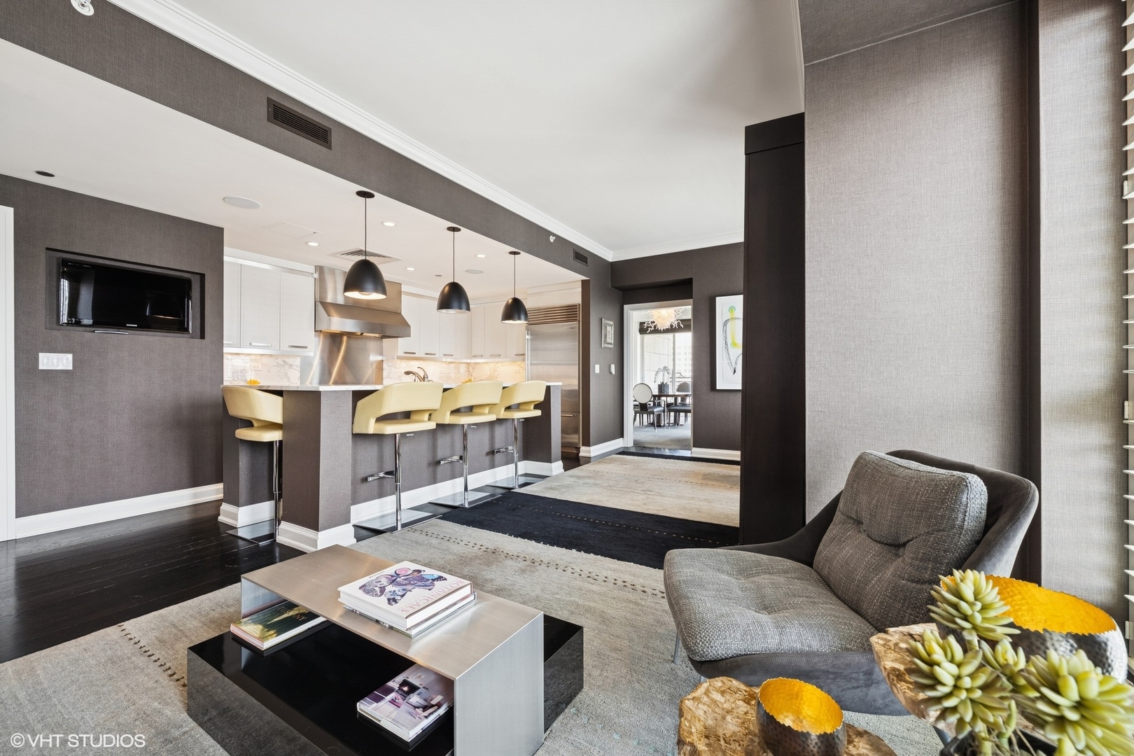 11 East Walton Street, Unit 4101 Chicago, IL 60611 - Photo 22 of 45 a living room with furniture and a flat screen tv