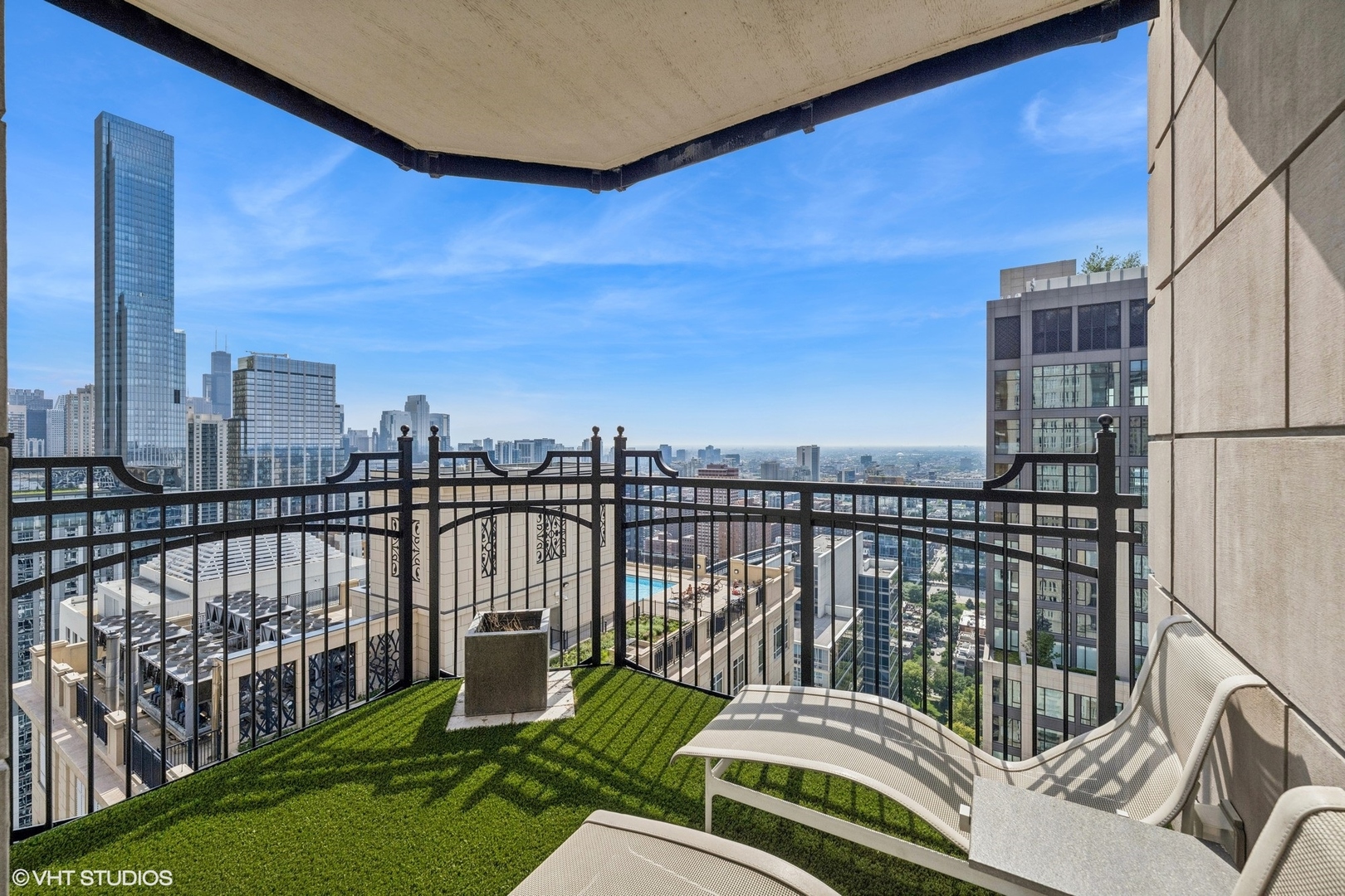 11 East Walton Street, Unit 4101 Chicago, IL 60611 - Photo 27 of 45 a balcony with a water view