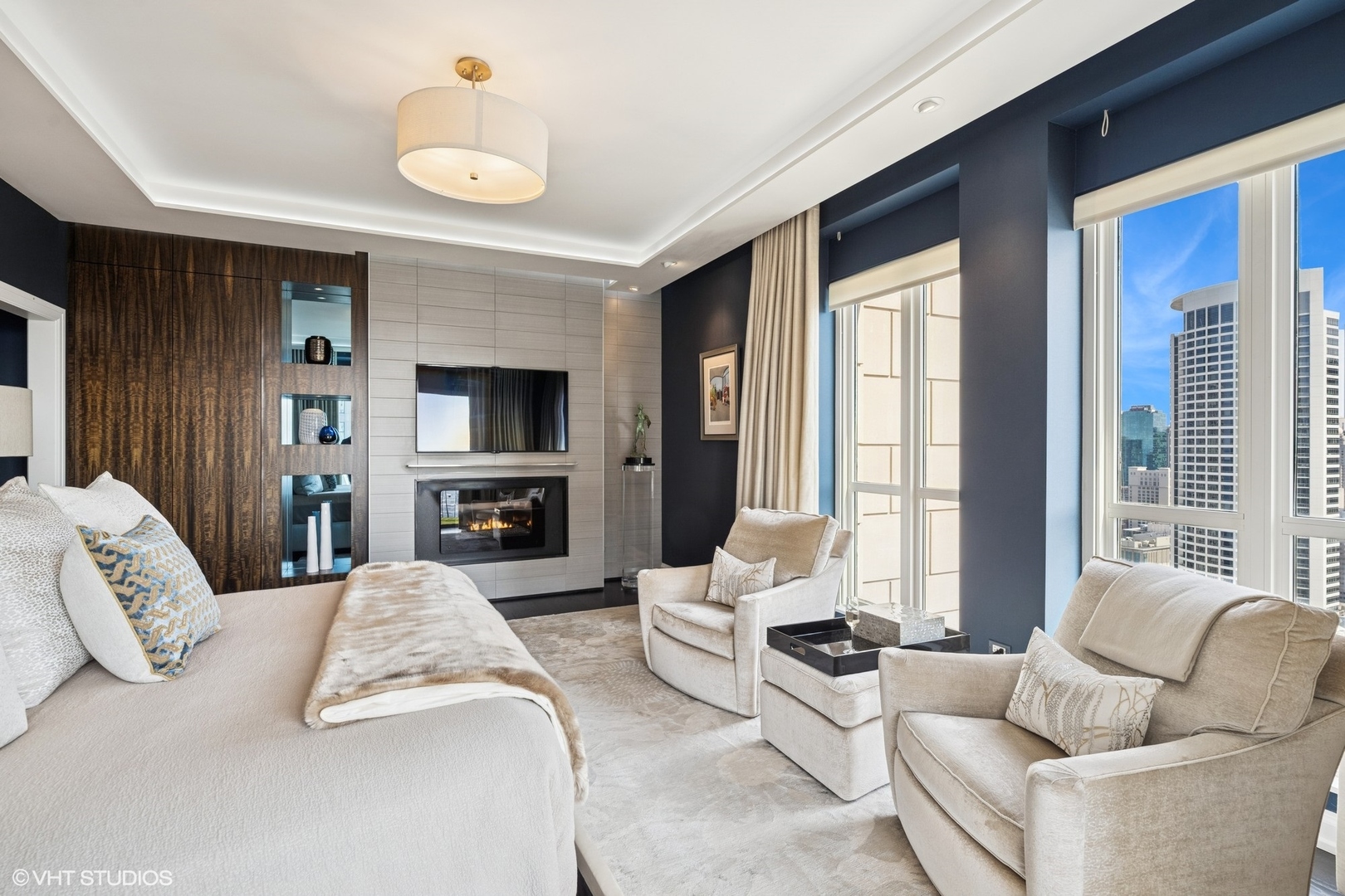 11 East Walton Street, Unit 4101 Chicago, IL 60611 - Photo 28 of 45 a living room with furniture fireplace and a large window