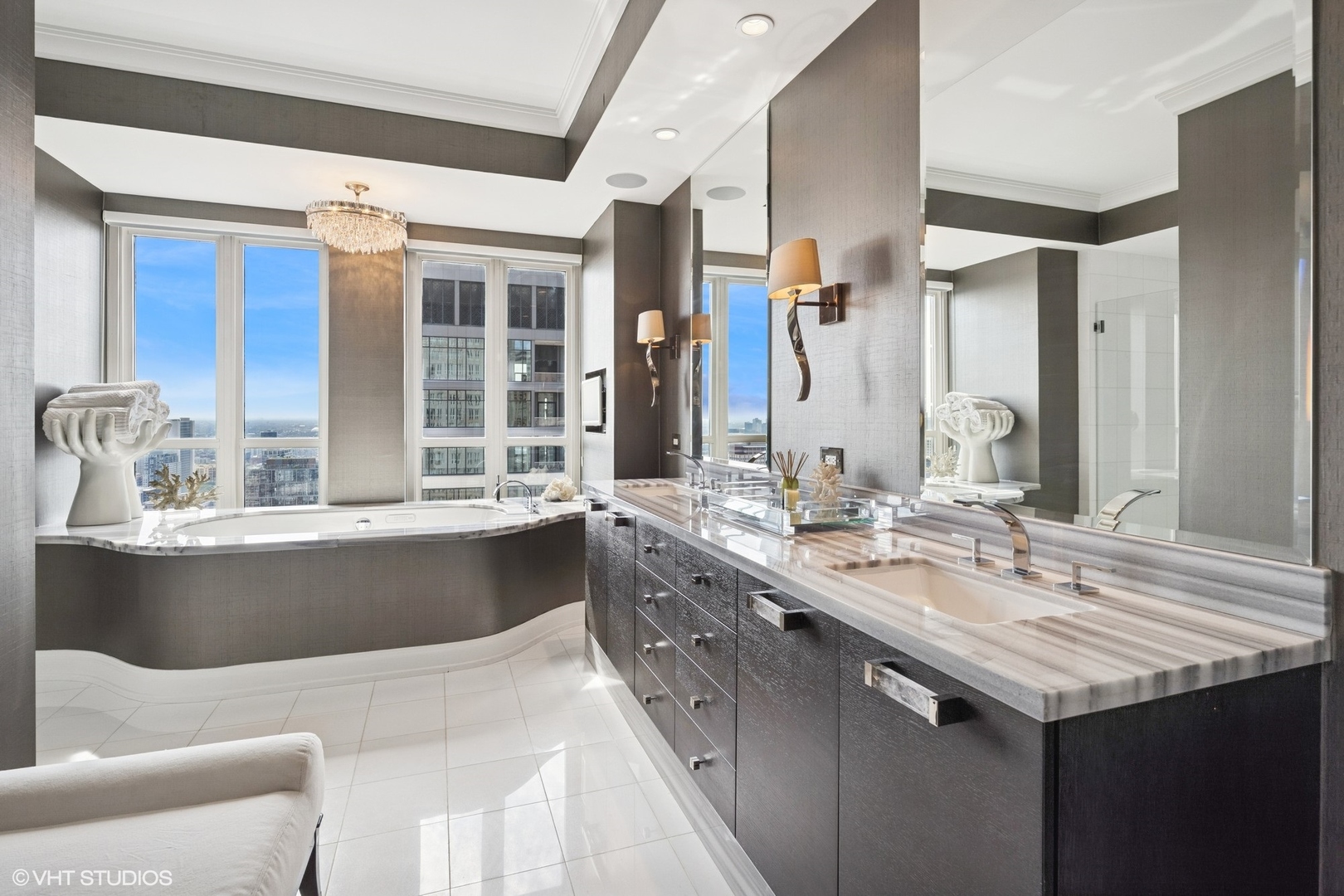 11 East Walton Street, Unit 4101 Chicago, IL 60611 - Photo 30 of 45 a bathroom with a granite countertop sink and a mirror