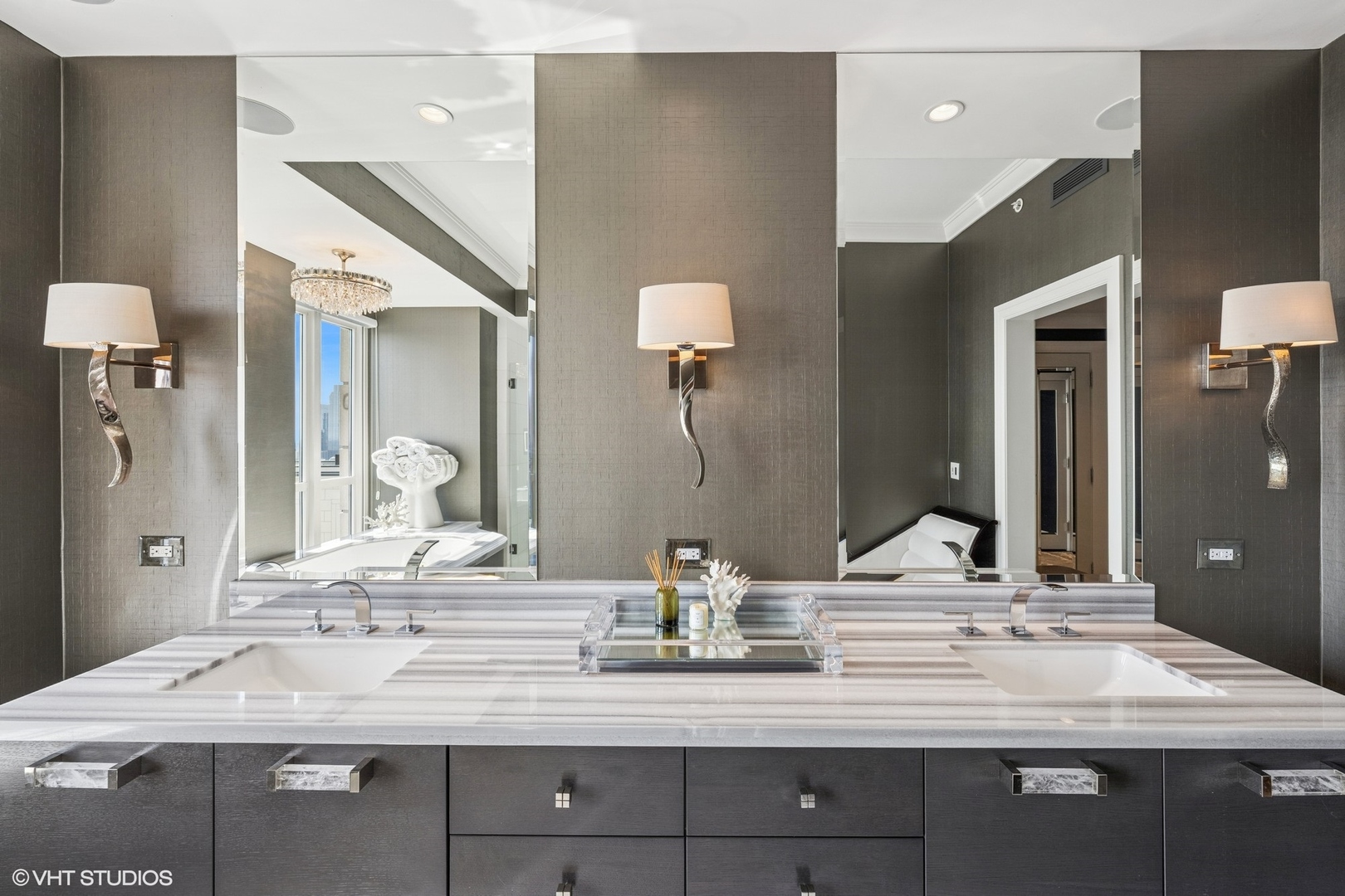 11 East Walton Street, Unit 4101 Chicago, IL 60611 - Photo 33 of 45 a bathroom with a granite countertop sink and a mirror