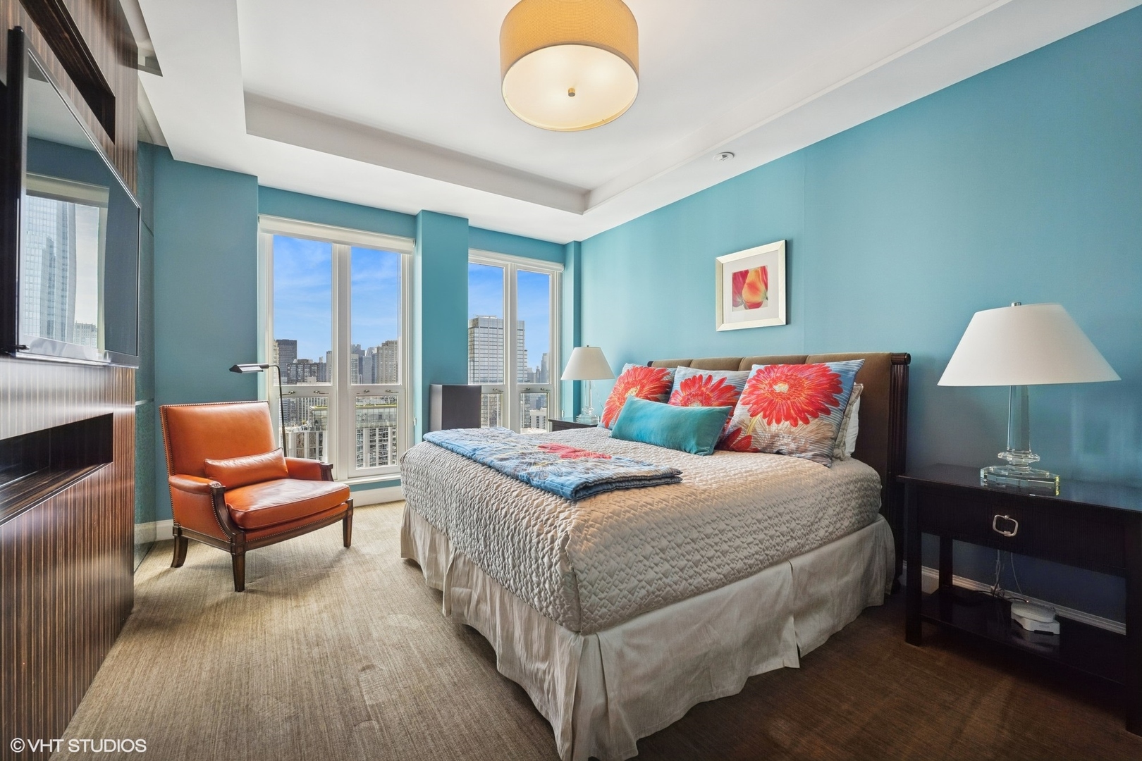 11 East Walton Street, Unit 4101 Chicago, IL 60611 - Photo 34 of 45 a bedroom with a bed and a lamp