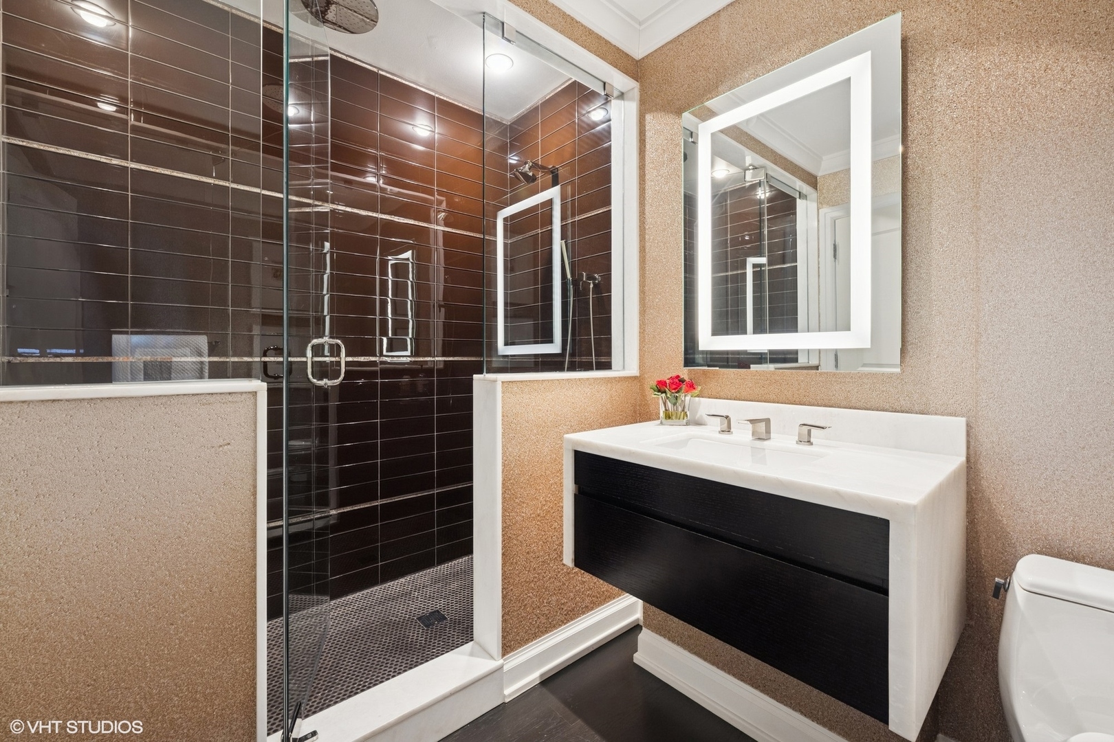 11 East Walton Street, Unit 4101 Chicago, IL 60611 - Photo 36 of 45 a bathroom with a sink toilet and shower