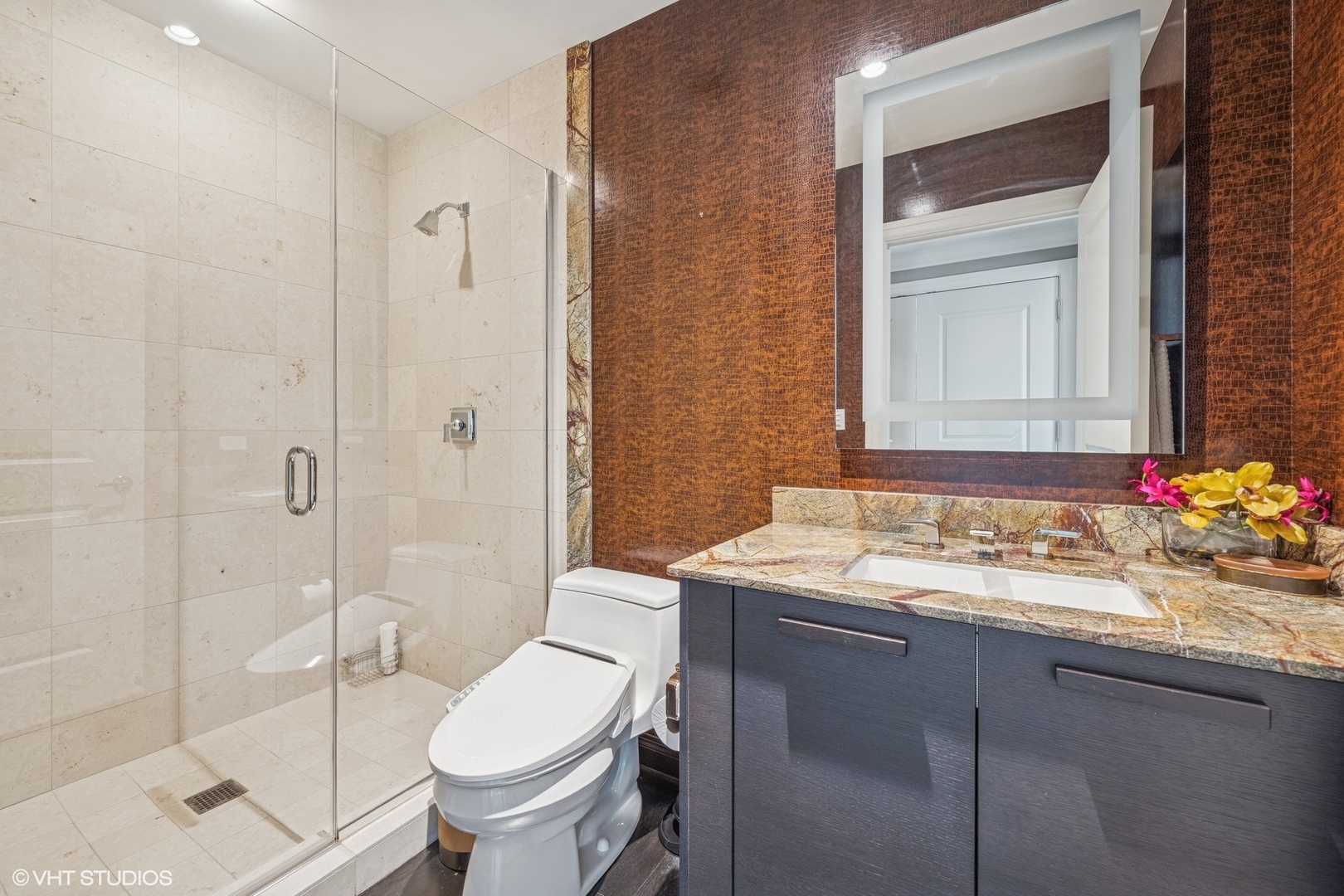 11 East Walton Street, Unit 4101 Chicago, IL 60611 - Photo 38 of 45 a bathroom with a sink toilet and shower