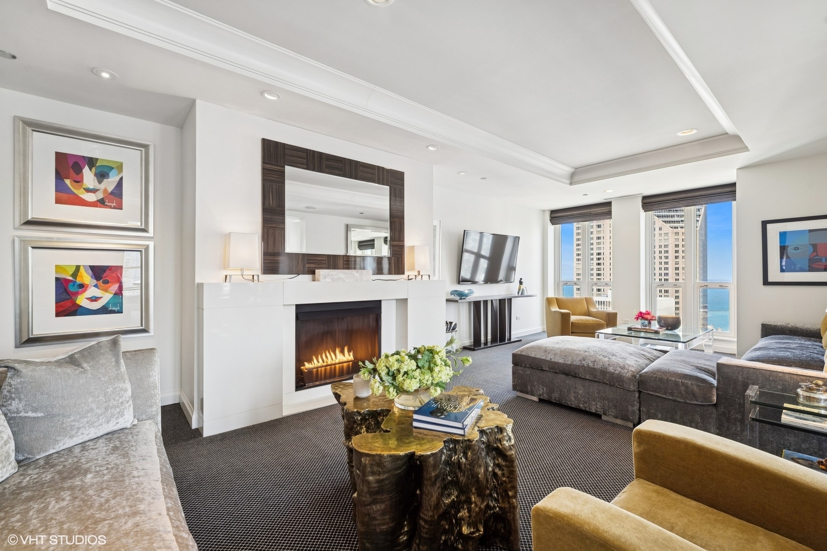 11 East Walton Street, Unit 4101 Chicago, IL 60611 - Photo 5 of 45 a living room with furniture and a fireplace