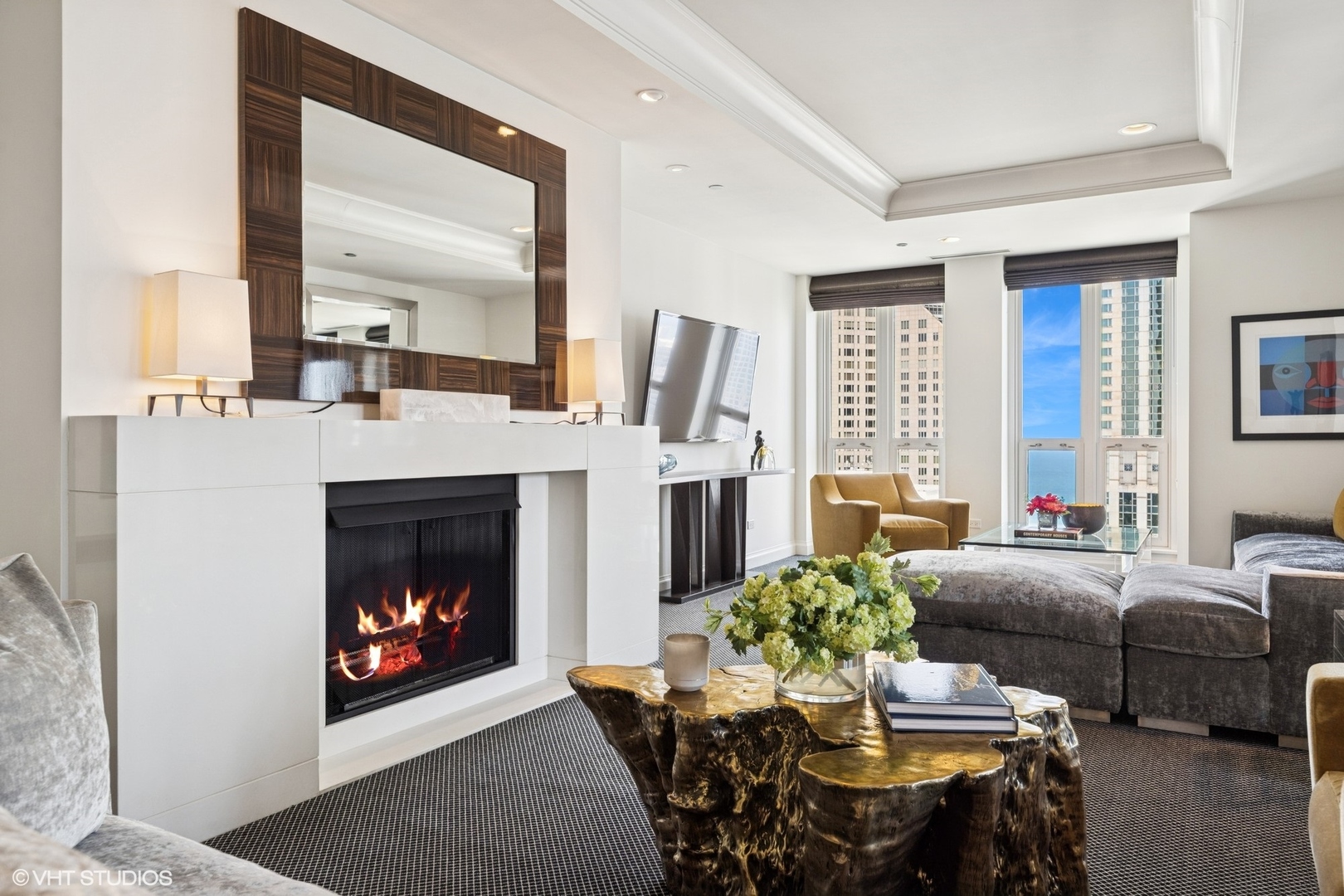 11 East Walton Street, Unit 4101 Chicago, IL 60611 - Photo 7 of 45 a living room with furniture and a fireplace