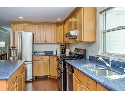 68 Harding Road Lexington, MA 02420 - Photo 15 of 41 a kitchen with stainless steel appliances granite countertop a sink stove and refrigerator