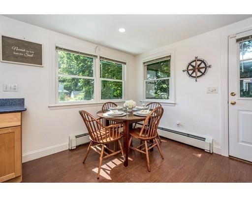 68 Harding Road Lexington, MA 02420 - Photo 19 of 41 a view of a dining room with furniture window and outside view