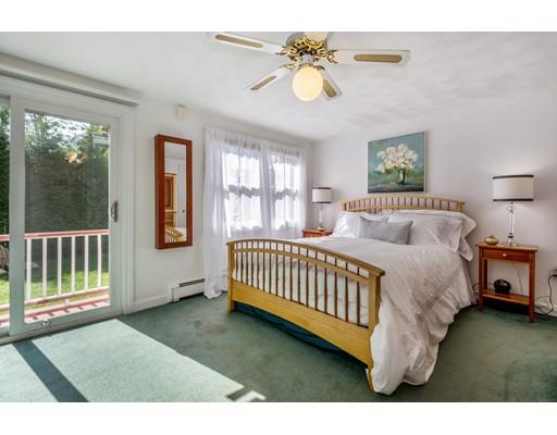 68 Harding Road Lexington, MA 02420 - Photo 20 of 41 a bed sitting in a bedroom next to a window