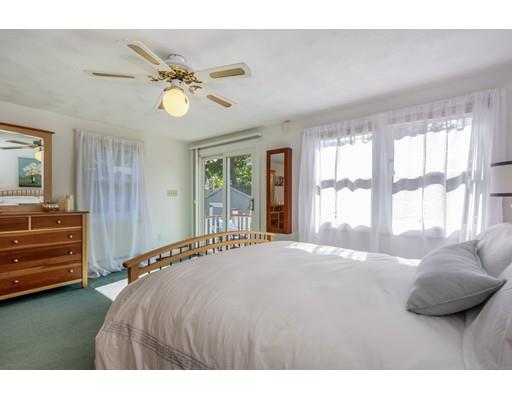 68 Harding Road Lexington, MA 02420 - Photo 22 of 41 a bedroom with a bed and a large window
