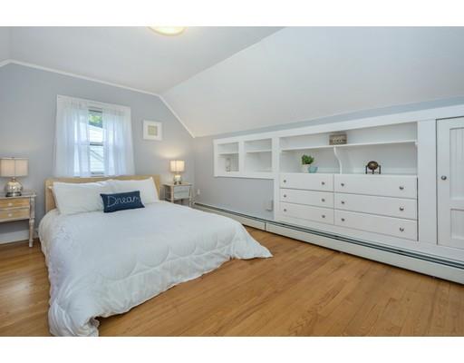 68 Harding Road Lexington, MA 02420 - Photo 26 of 41 a spacious bedroom with a bed and cabinet
