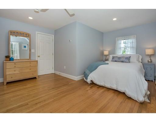 68 Harding Road Lexington, MA 02420 - Photo 28 of 41 a bedroom with a bed and a night stand