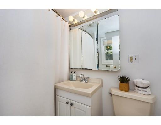 68 Harding Road Lexington, MA 02420 - Photo 29 of 41 a bathroom with a sink vanity and a mirror