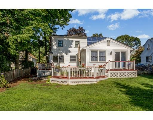 68 Harding Road Lexington, MA 02420 - Photo 35 of 41 a front view of a house with a garden