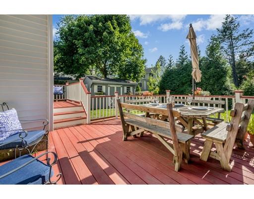 68 Harding Road Lexington, MA 02420 - Photo 39 of 41 a view of a chairs and table on the deck