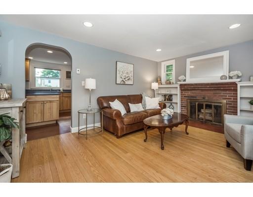 68 Harding Road Lexington, MA 02420 - Photo 4 of 41 a living room with furniture and a fireplace
