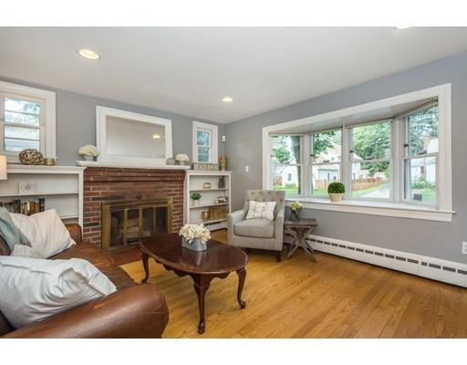 68 Harding Road Lexington, MA 02420 - Photo 5 of 41 a living room with furniture and a fireplace