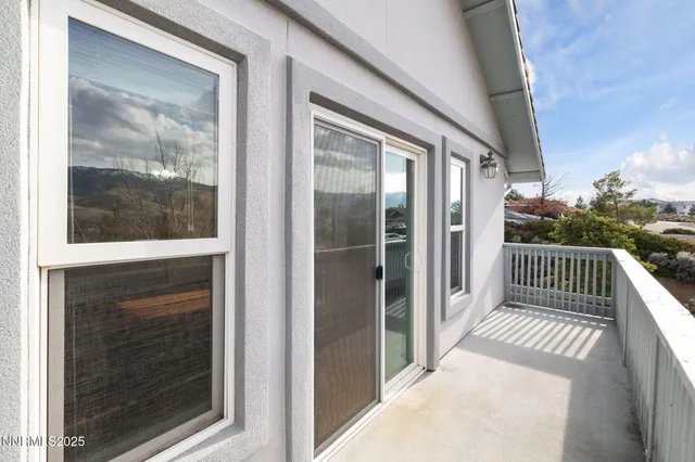 a view of a city from a balcony