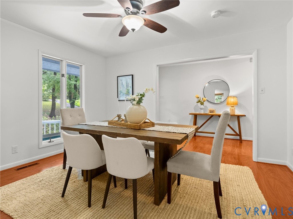 1625 Stone River Road North Chesterfield, VA 23235 - Photo 13 of 49 Dining area with wood-finish flooring, white walls