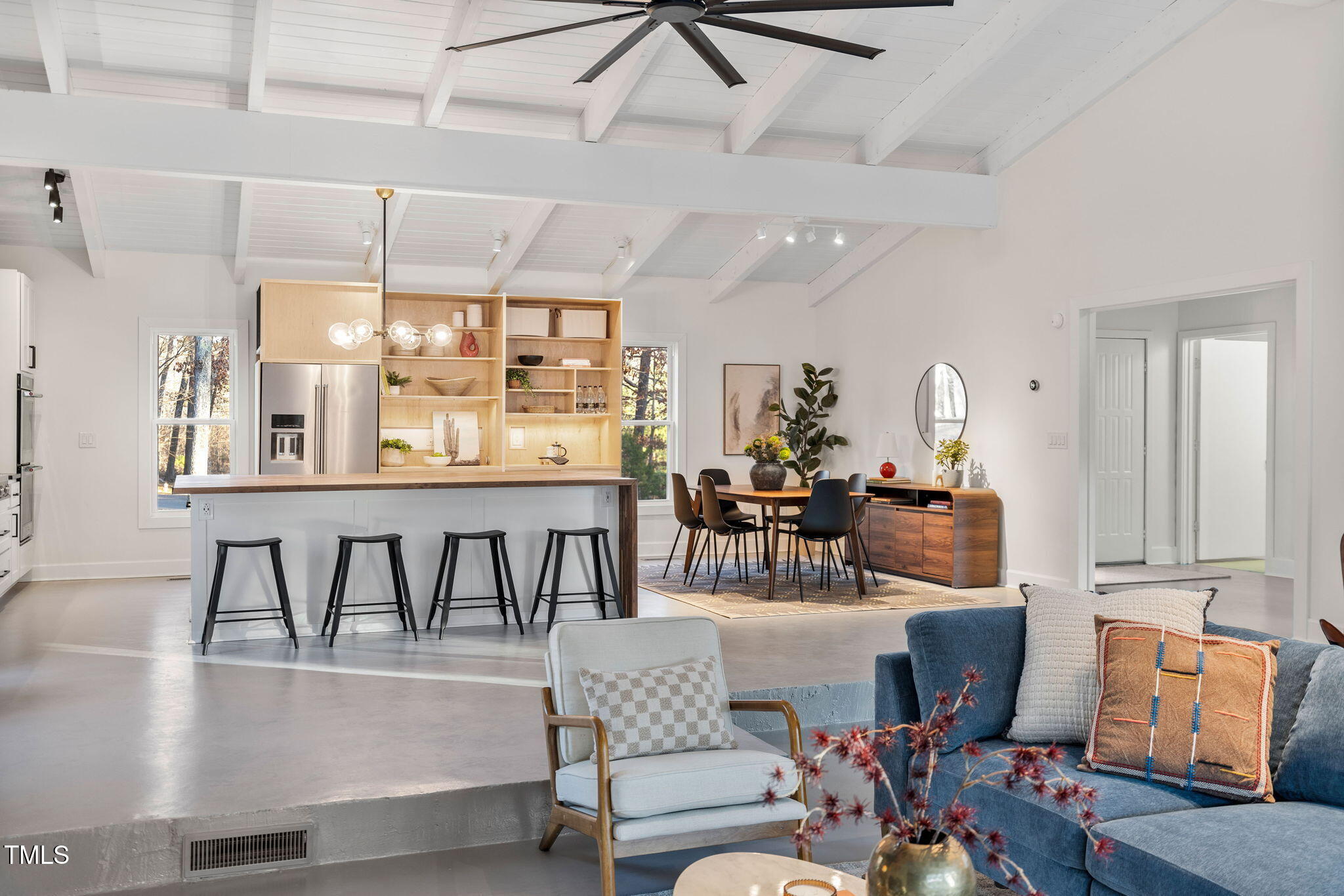 110 Continental Drive Durham, NC 27712 - Photo 16 of 51 a living room with furniture and a large window