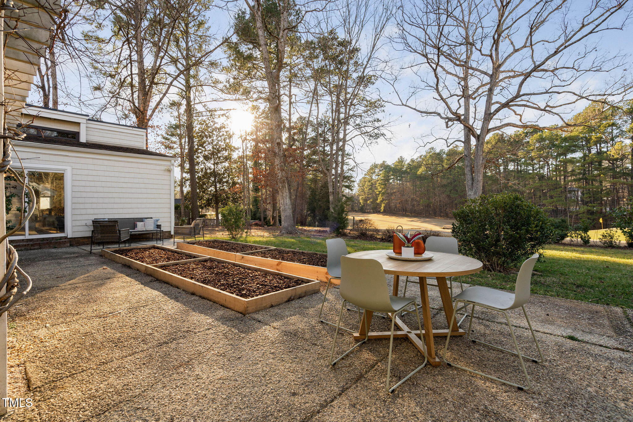 110 Continental Drive Durham, NC 27712 - Photo 22 of 51 a backyard of a house with table and chairs