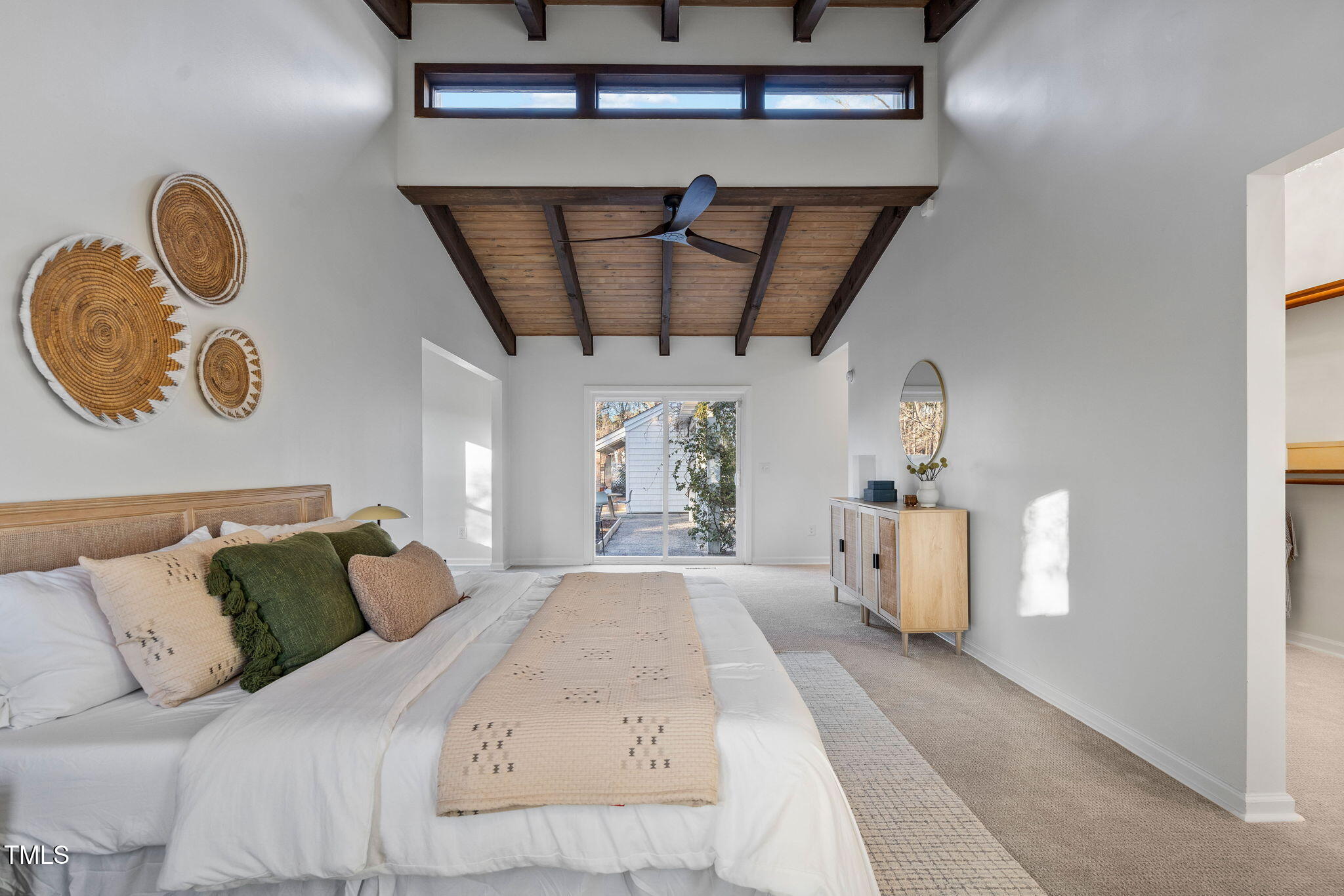 110 Continental Drive Durham, NC 27712 - Photo 29 of 51 a bed room with a bed and painting on the wall