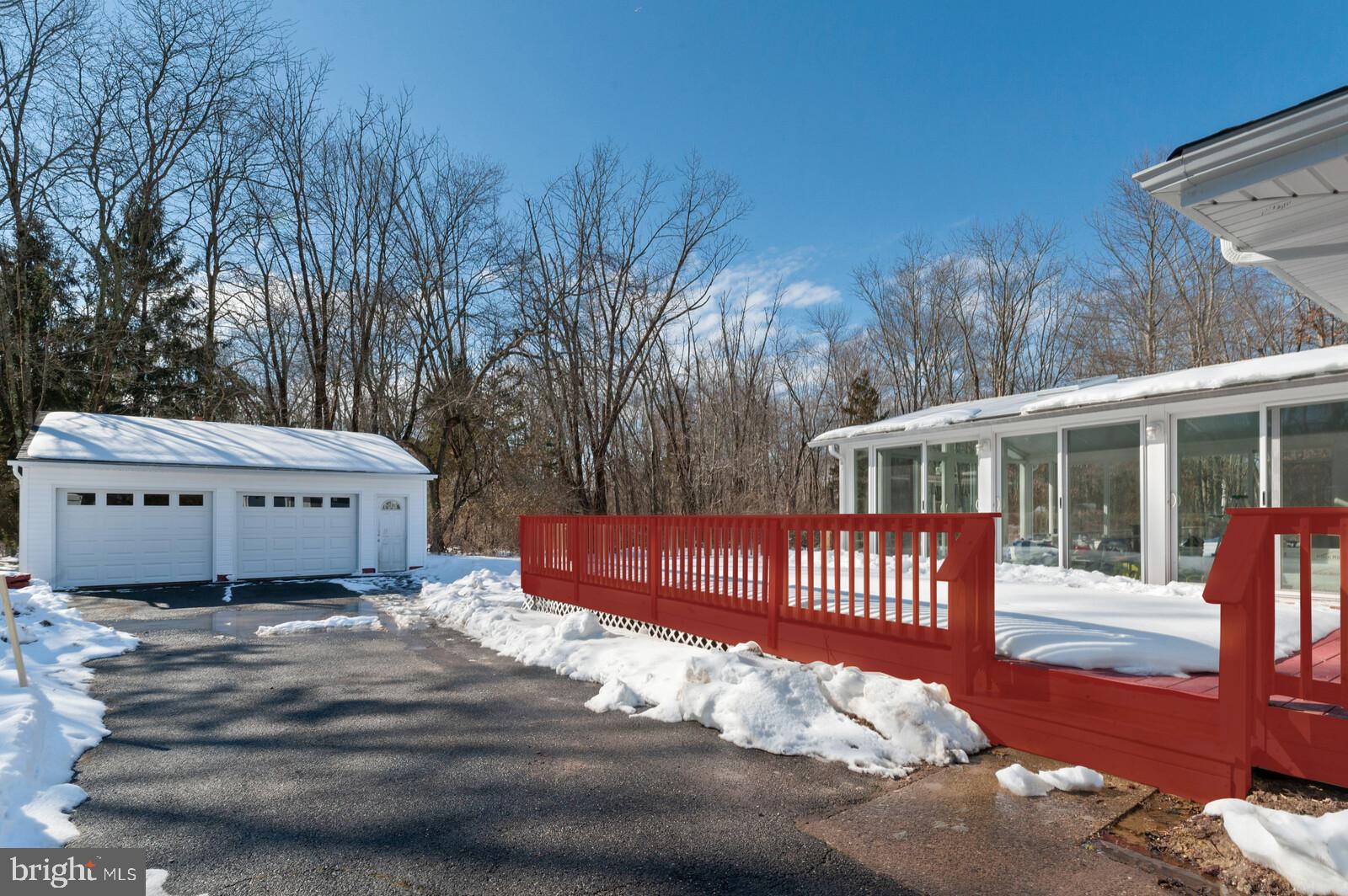 303 Carter Road Princeton, NJ 08540 - Photo 22 of 25 Driveway leading to 2 car garage with electric