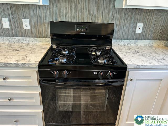 8220 Airport Road, Unit TRLR 17 Bath, PA 18014 - Photo 11 of 25 a stove top oven sitting inside of a kitchen