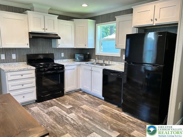8220 Airport Road, Unit TRLR 17 Bath, PA 18014 - Photo 16 of 25 a kitchen with a refrigerator and a stove