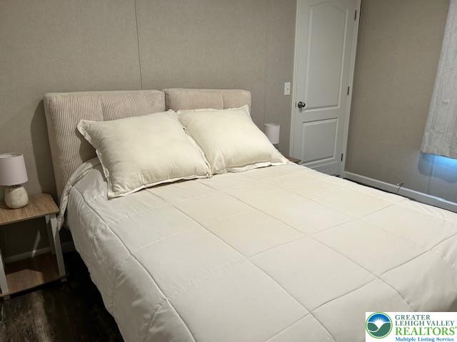 8220 Airport Road, Unit TRLR 17 Bath, PA 18014 - Photo 18 of 25 a large white bed in a small room