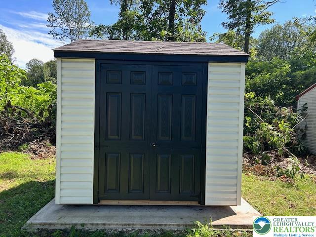 8220 Airport Road, Unit TRLR 17 Bath, PA 18014 - Photo 25 of 25 a view of a small house with yard