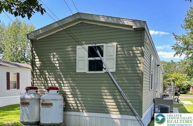8220 Airport Road, Unit TRLR 17 Bath, PA 18014 - Photo 3 of 25 a front view of a house with balcony
