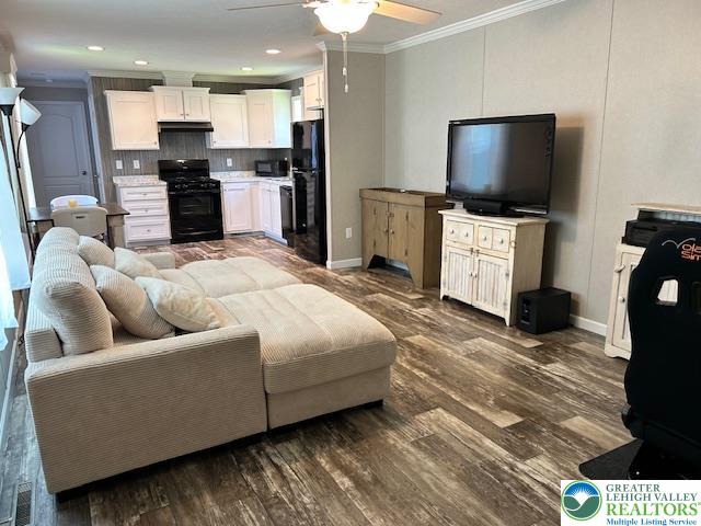 8220 Airport Road, Unit TRLR 17 Bath, PA 18014 - Photo 5 of 25 a living room with furniture and a flat screen tv