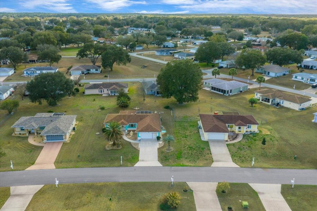6145 Southwest 100th Loop Ocala, FL 34476 - Photo 40 of 54 an aerial view of a house with a yard lake view