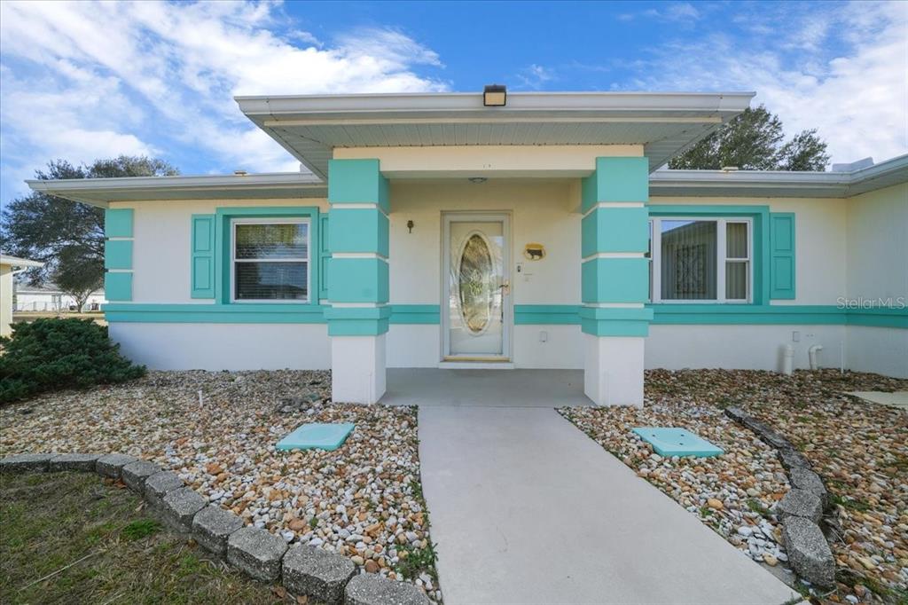 6145 Southwest 100th Loop Ocala, FL 34476 - Photo 43 of 54 front view of a house