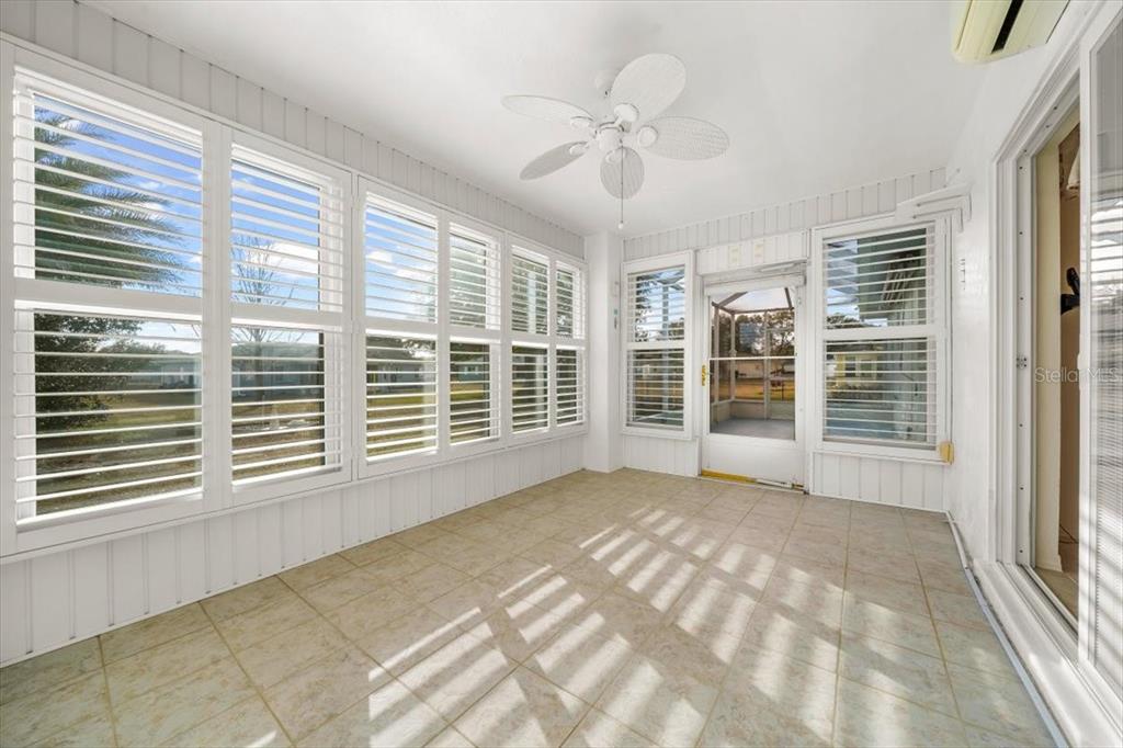 6145 Southwest 100th Loop Ocala, FL 34476 - Photo 5 of 54 a view of an empty room with a window