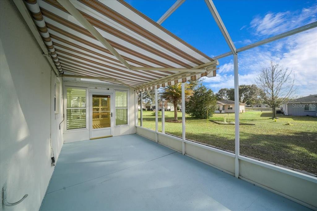 6145 Southwest 100th Loop Ocala, FL 34476 - Photo 51 of 54 a view of a house with a porch