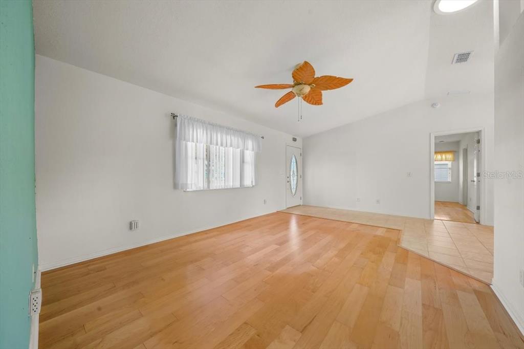 6145 Southwest 100th Loop Ocala, FL 34476 - Photo 10 of 54 a view of an empty room with a window