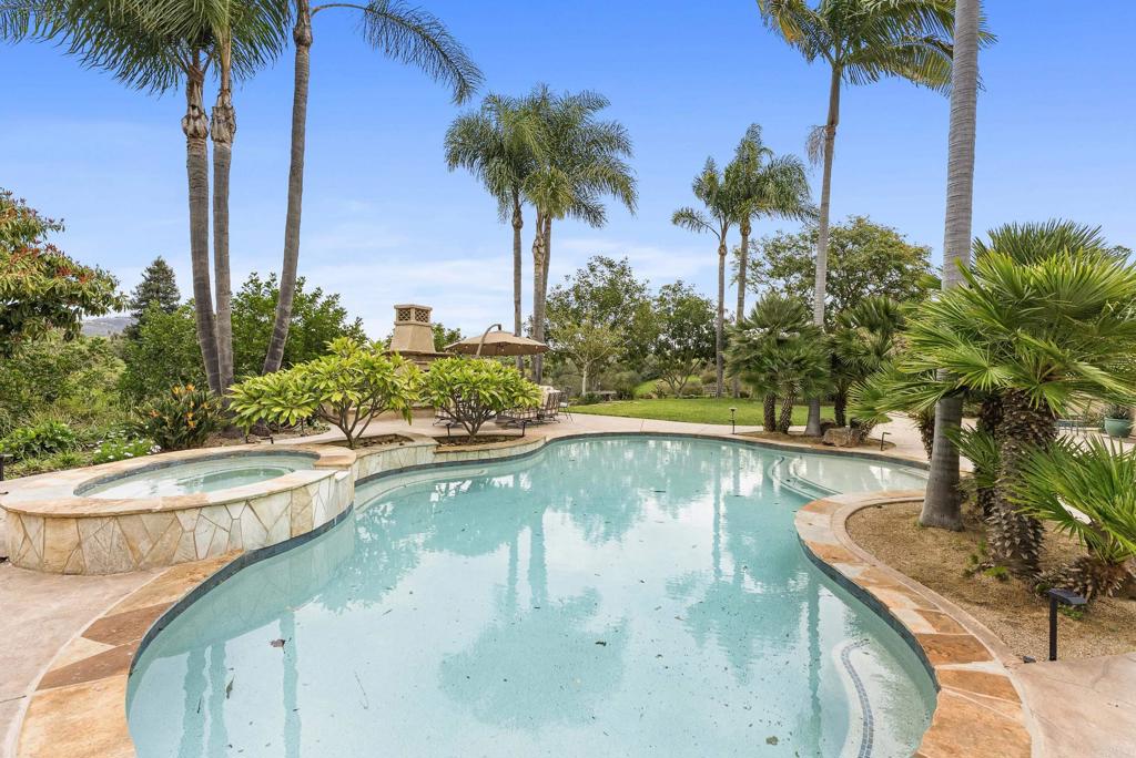 7098 Via Monalex Rancho Santa Fe, CA 92067 - Photo 2 of 5 a view of a swimming pool and a chair