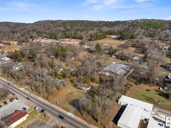 a aerial view of a house with a yard