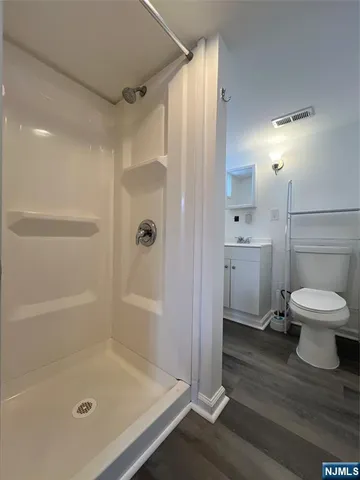 a view of a wooden deck and outdoor space