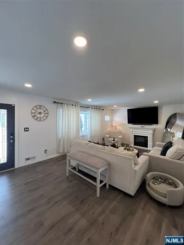 a kitchen with a sink and a stove top oven