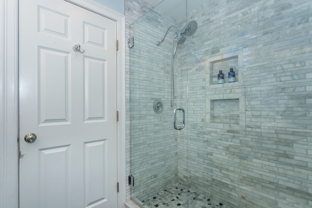 59 Endicott Street, Unit 59 Canton, MA 02021 - Photo 14 of 20 a bathroom with a shower