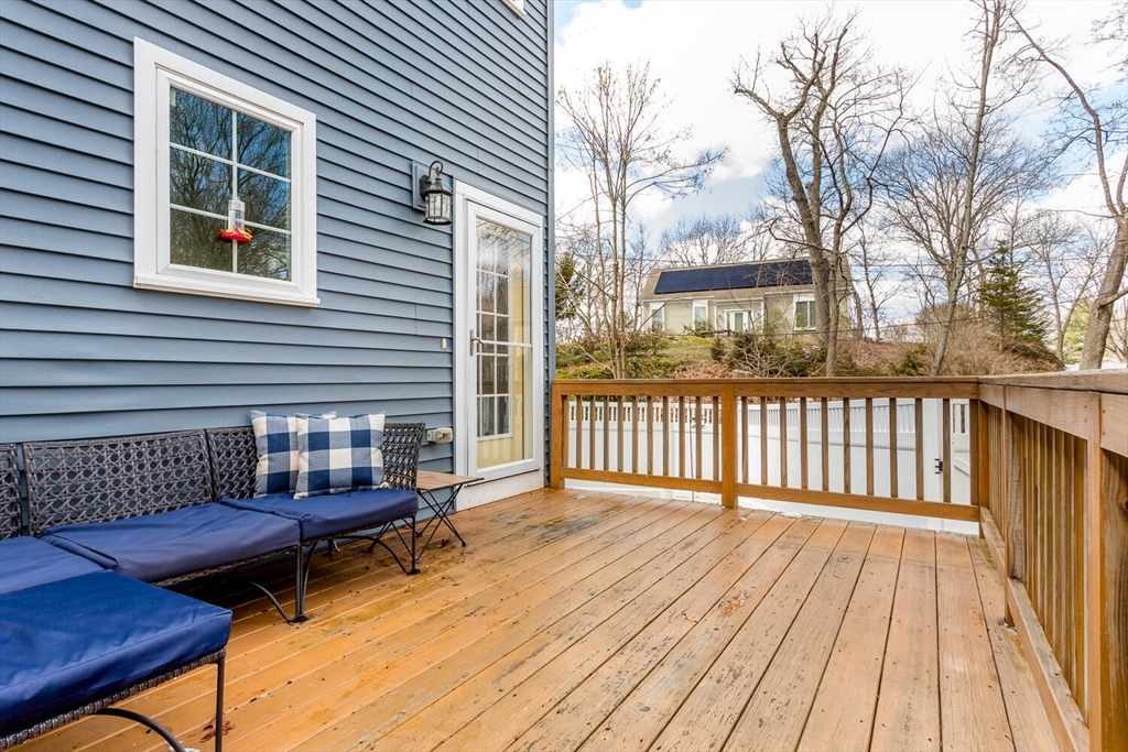 59 Endicott Street, Unit 59 Canton, MA 02021 - Photo 19 of 20 a view of a wooden chairs on the deck