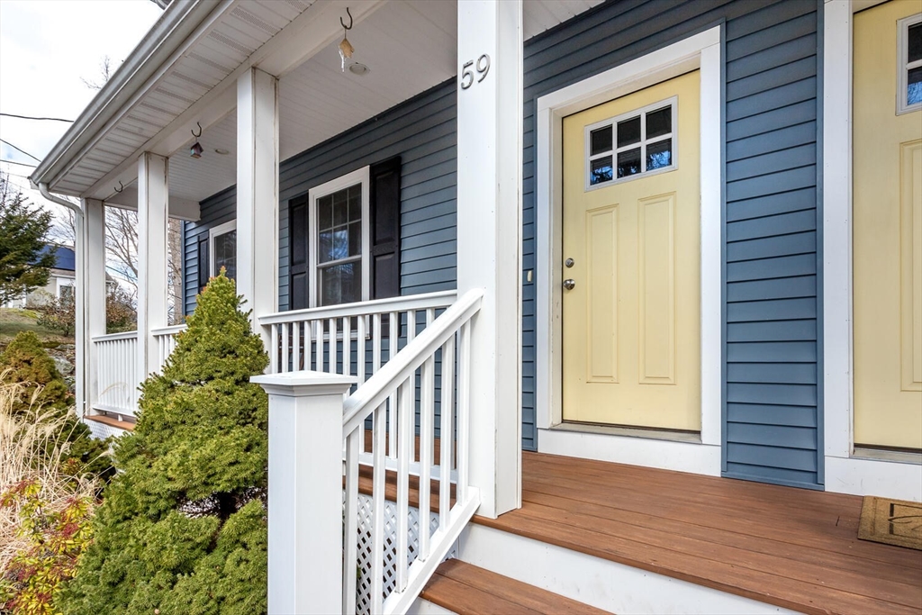 59 Endicott Street, Unit 59 Canton, MA 02021 - Photo 2 of 20 a view of porch with deck and yard