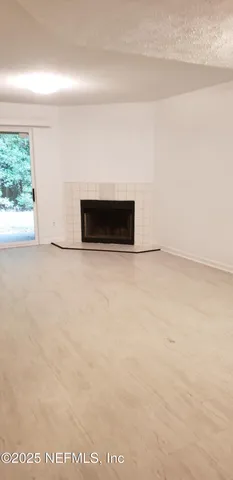 a kitchen with a stove and a refrigerator